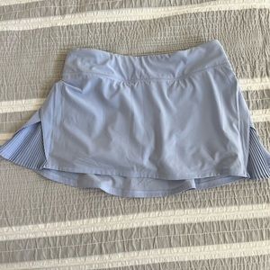 Lululemon mid-rise tennis skirt. Size 6. Length 15”.